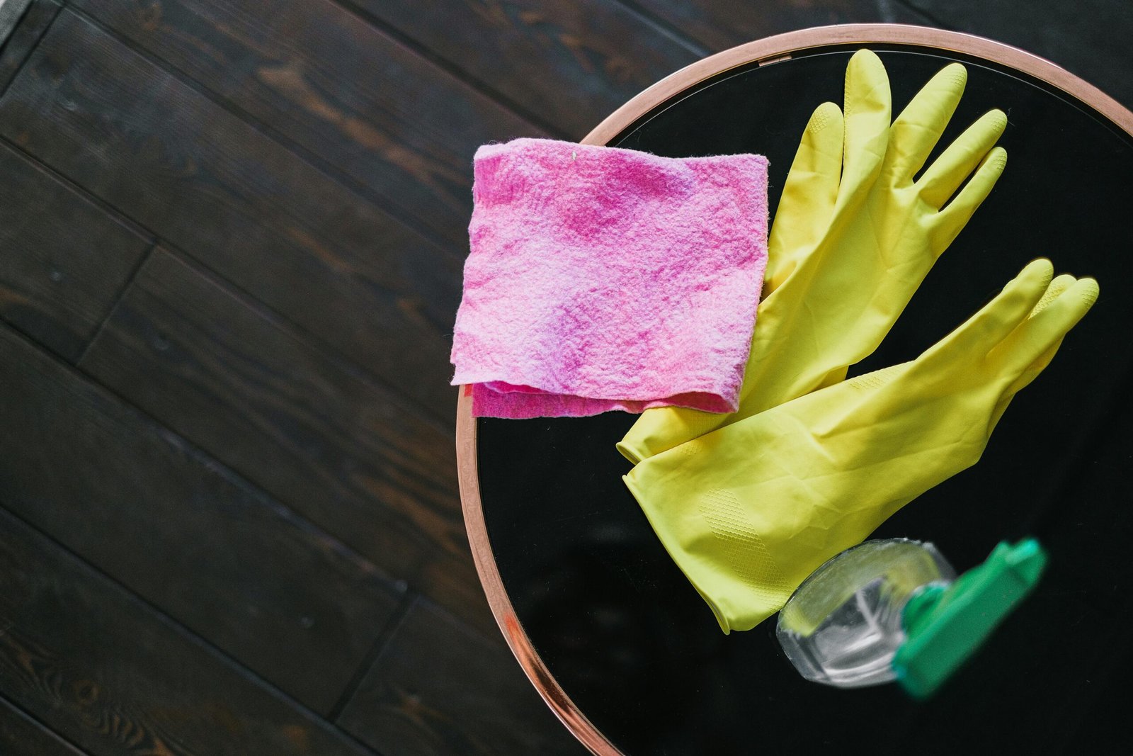 yellow gloves to depict spring cleaning