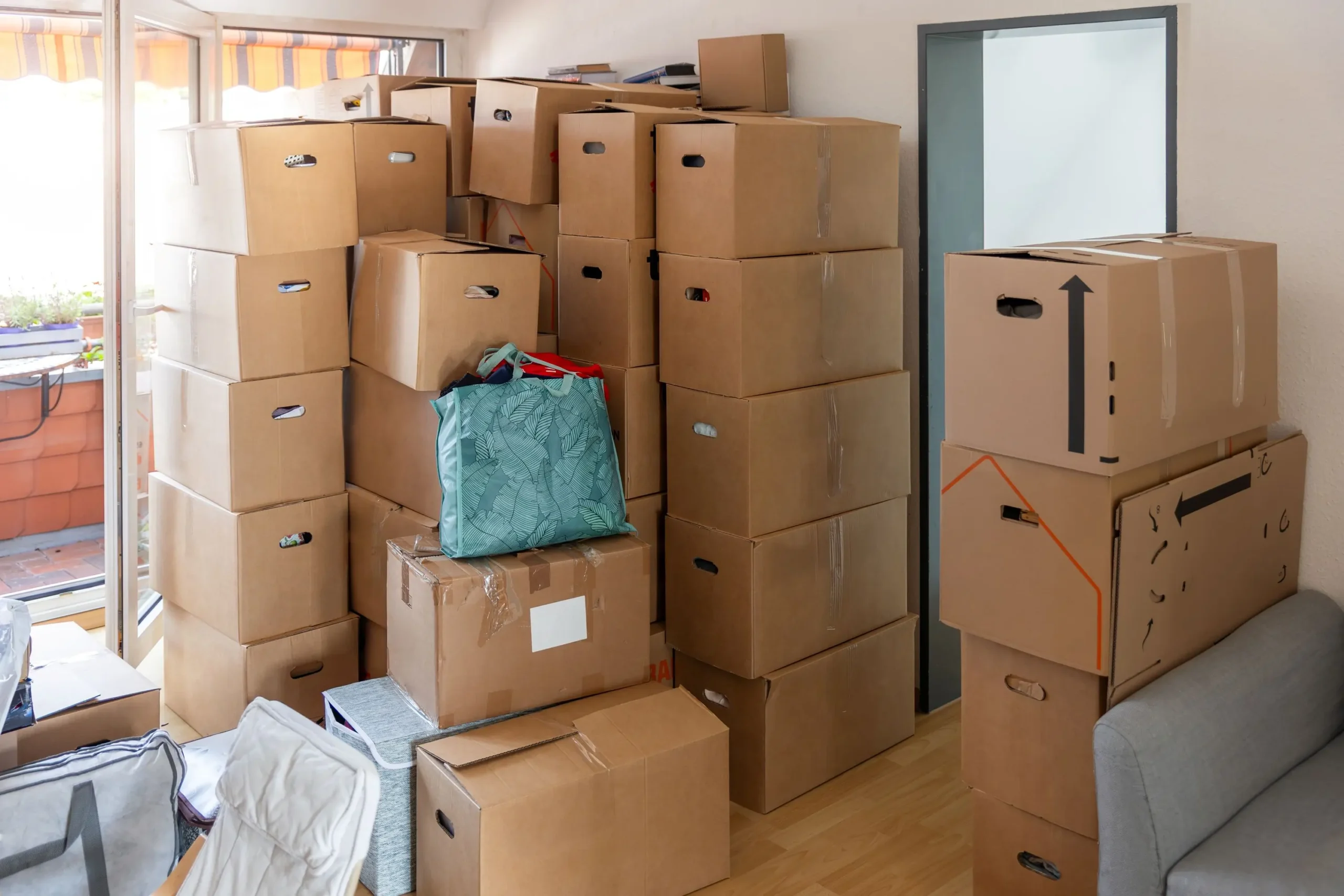 Residential disposal bin used for furniture and junk removal during pre-move declutter